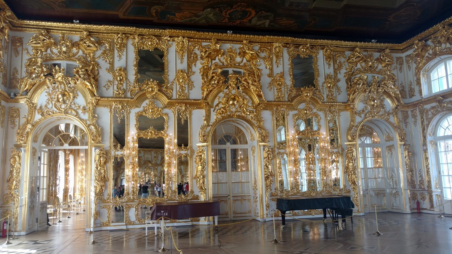 Gold leaf and chandeliers inside Catherine Palace
