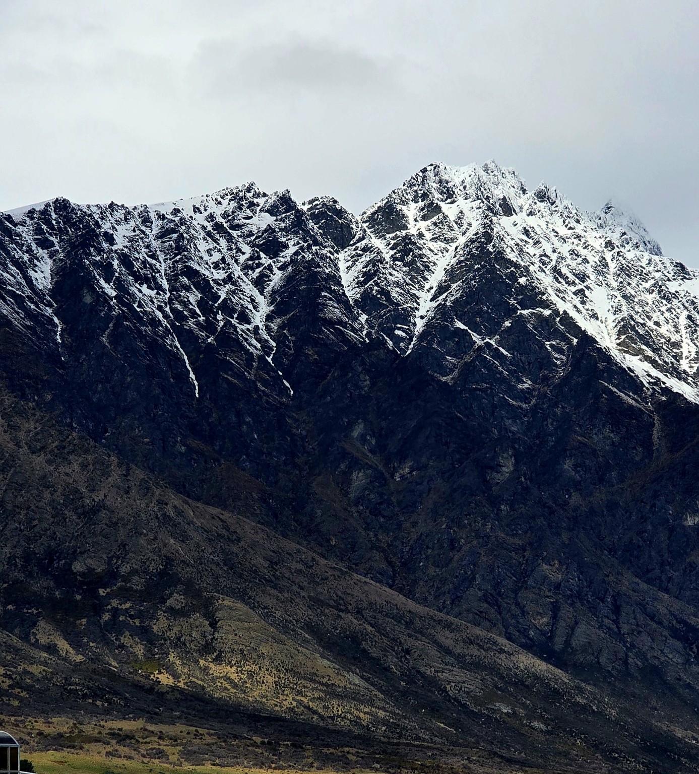 Snow on the steep schist slopes of the Remarkables