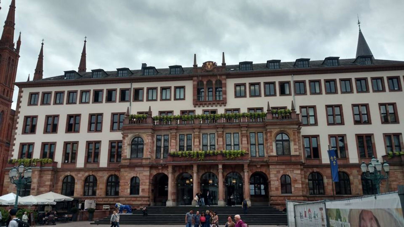 Wiesbaden's city hall area, where civic order meets red sandstone grandeur