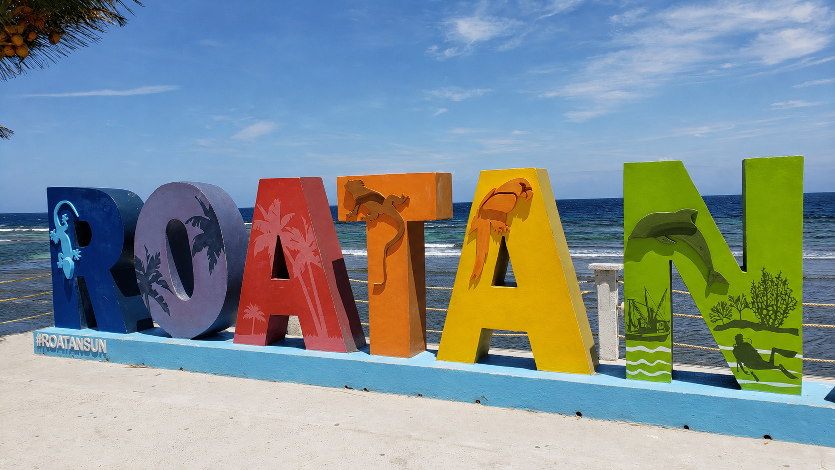 Roatán sign by the water in Honduras