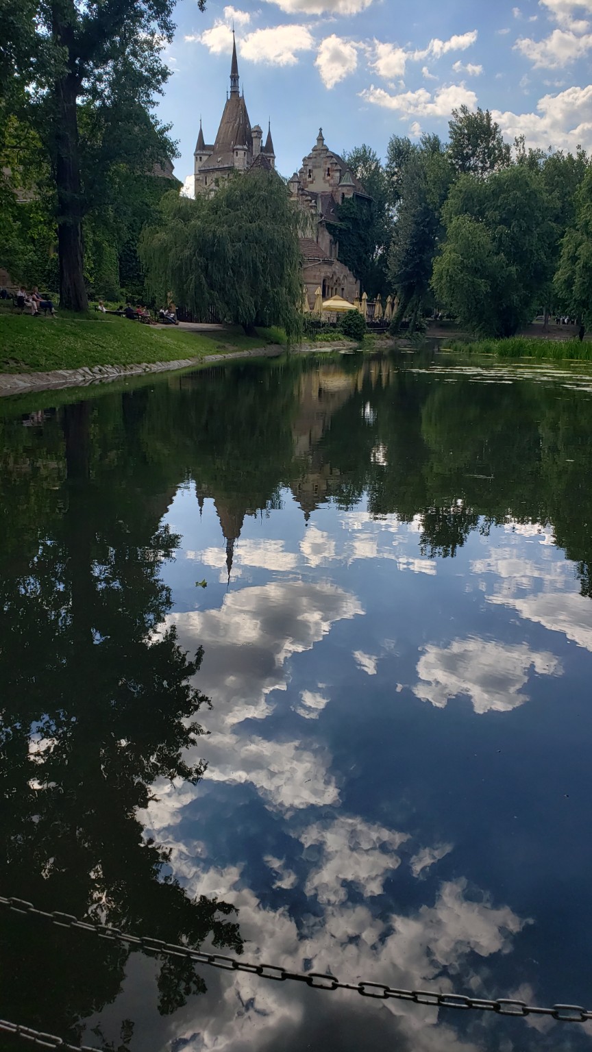 Vajdahunyad Castle reflected in the lake at City Park