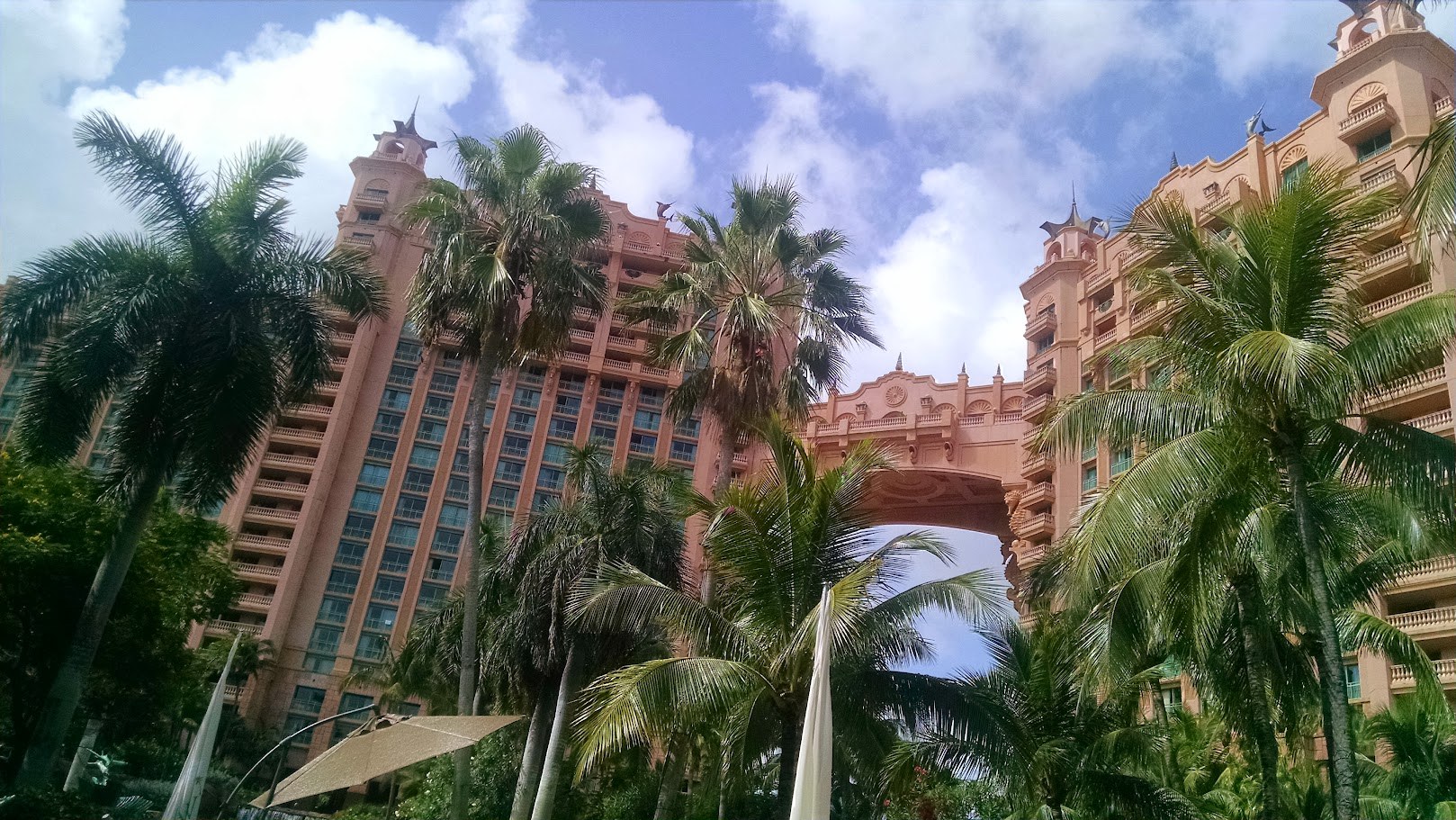 Atlantis rising over the beach, with those turquoise chairs lined up like vacation had assigned seating.