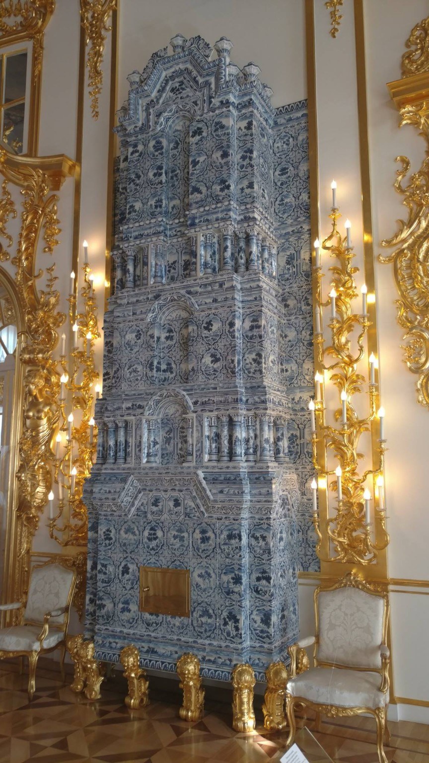 Ornate tiled stove inside Catherine Palace