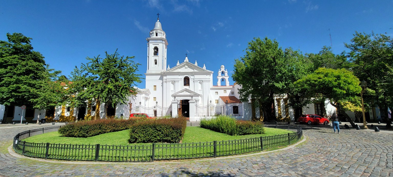 White colonial church with bell towers outside Buenos Aires