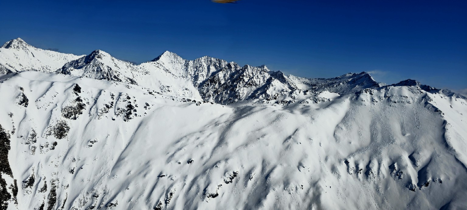 Snow-striped ridges of the Southern Alps