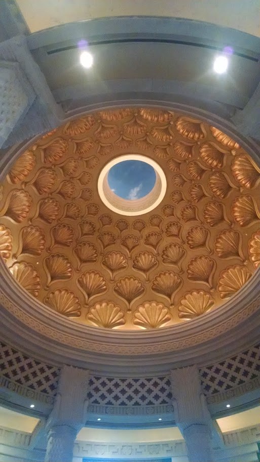 Inside Atlantis, a shell-patterned dome that feels part casino palace, part undersea mythology.