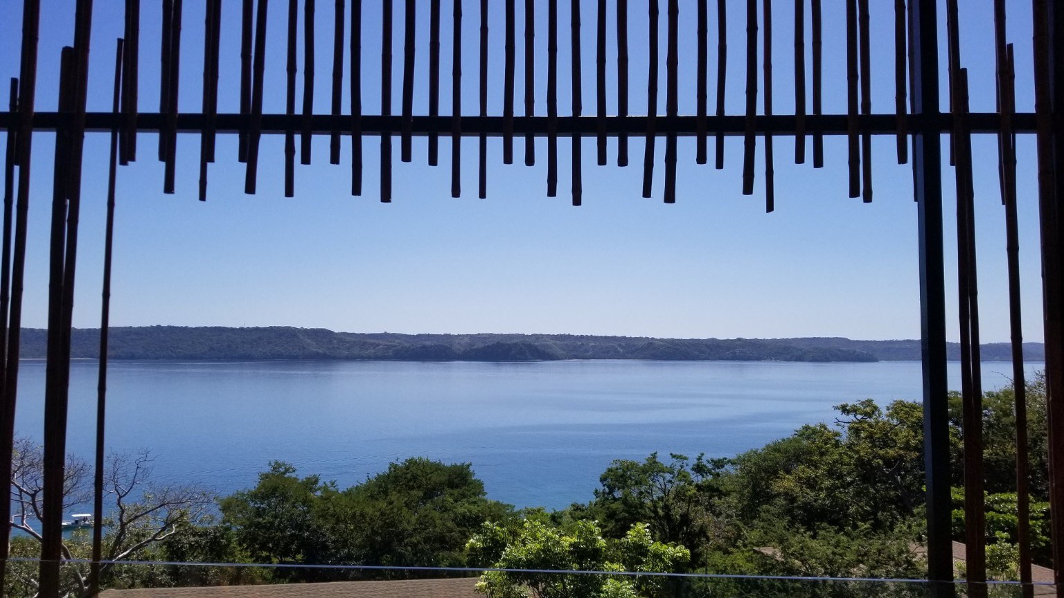 Water view from shaded resort area
