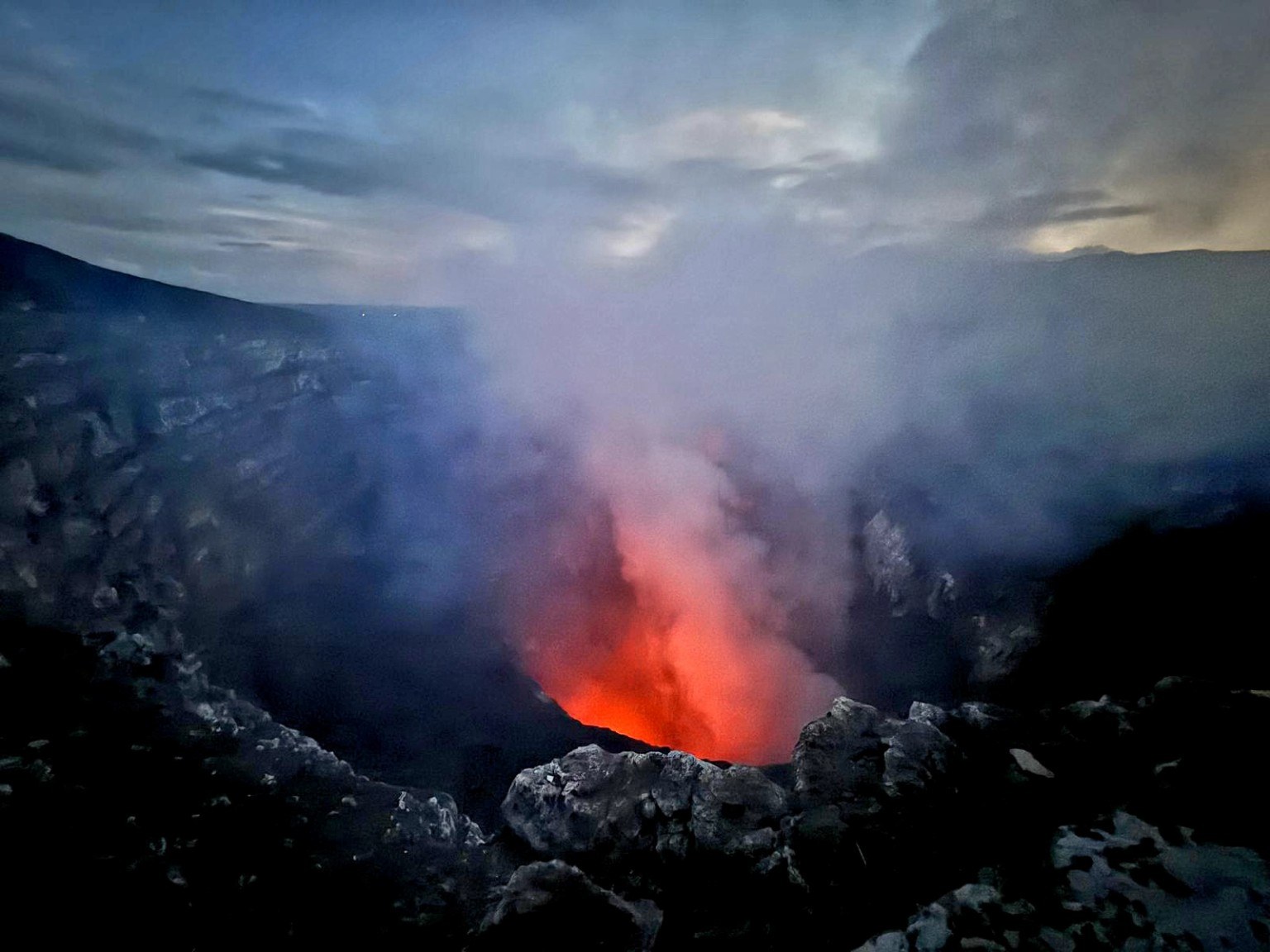 Masaya volcano crater glowing at dusk
