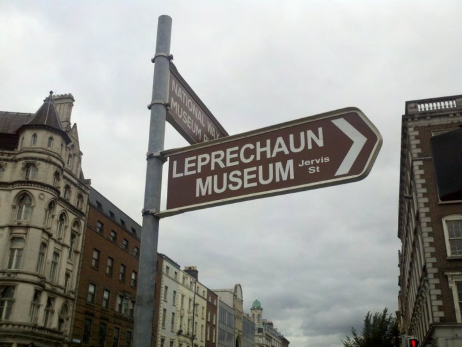 Leprechaun Museum directional sign on a Dublin street