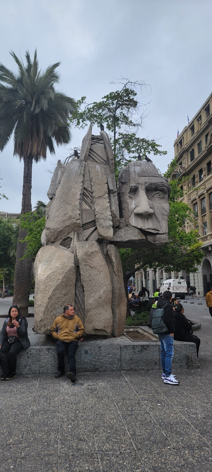 Large stone head sculpture in Santiago near Plaza de Armas