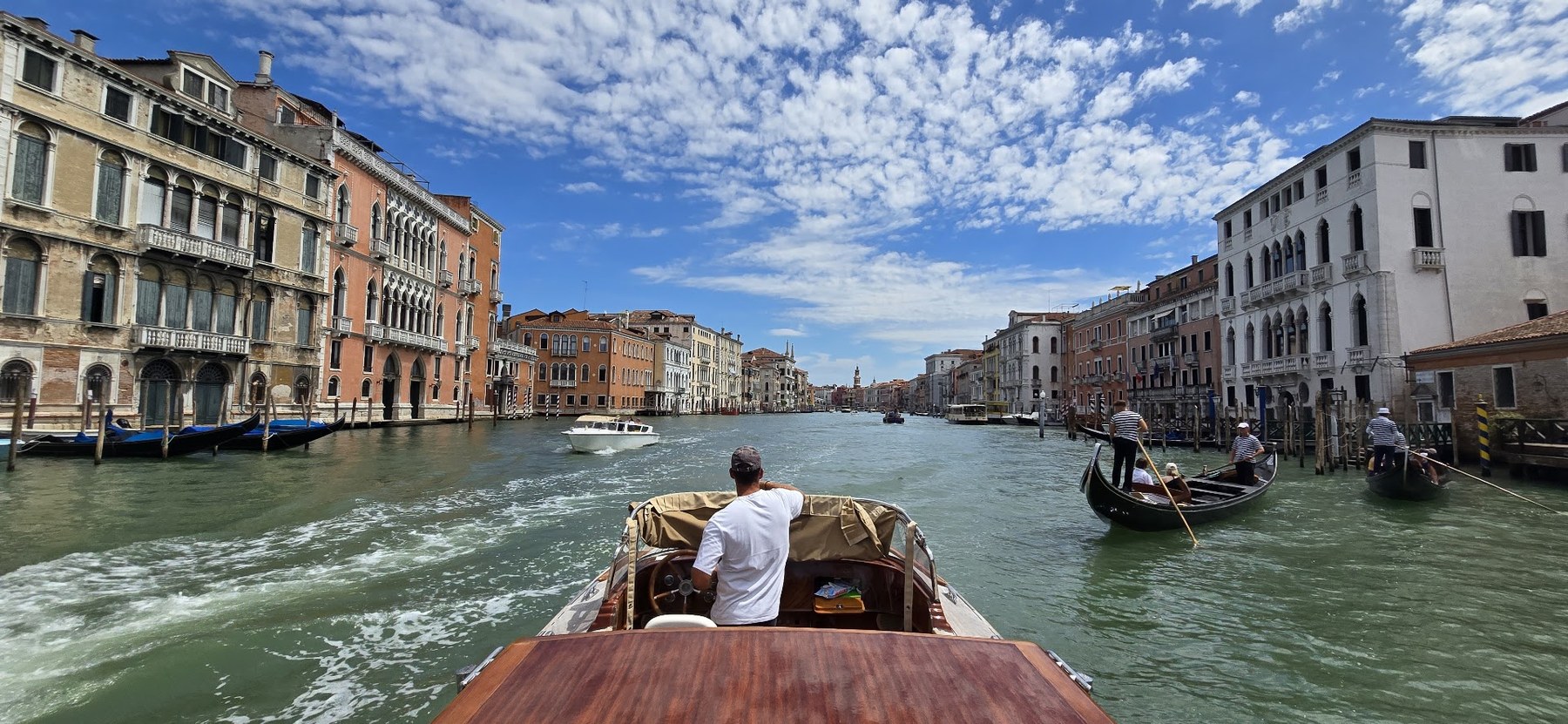 Venice Grand Canal from a boat, classic palazzi and water