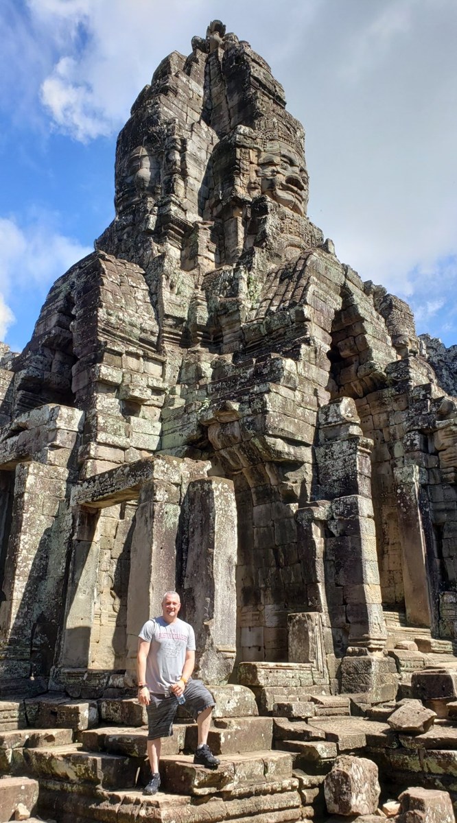 Bayon's monumental stonework with faces looking out from multiple directions