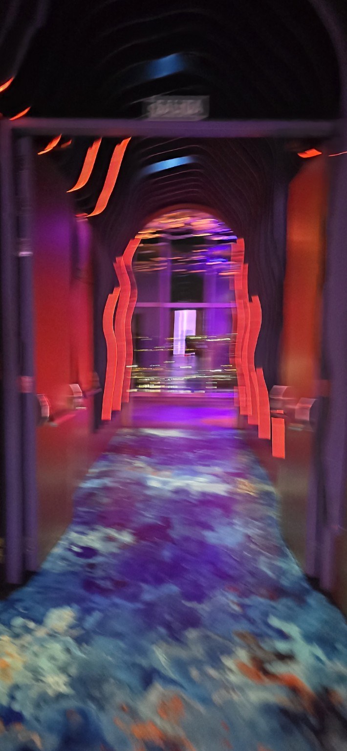 Neon-lit hallway at the W Barcelona