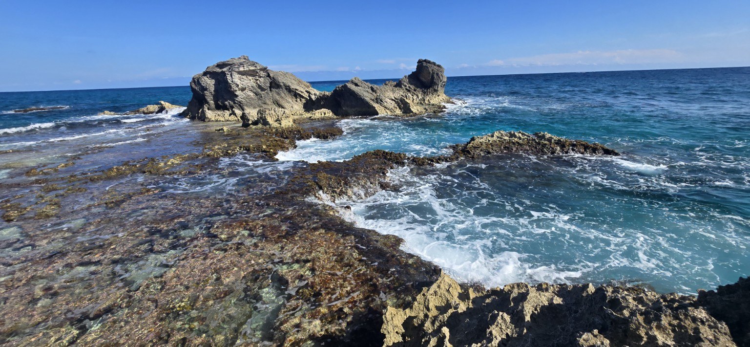 Isla Mujeres rocky coastline with bright blue water