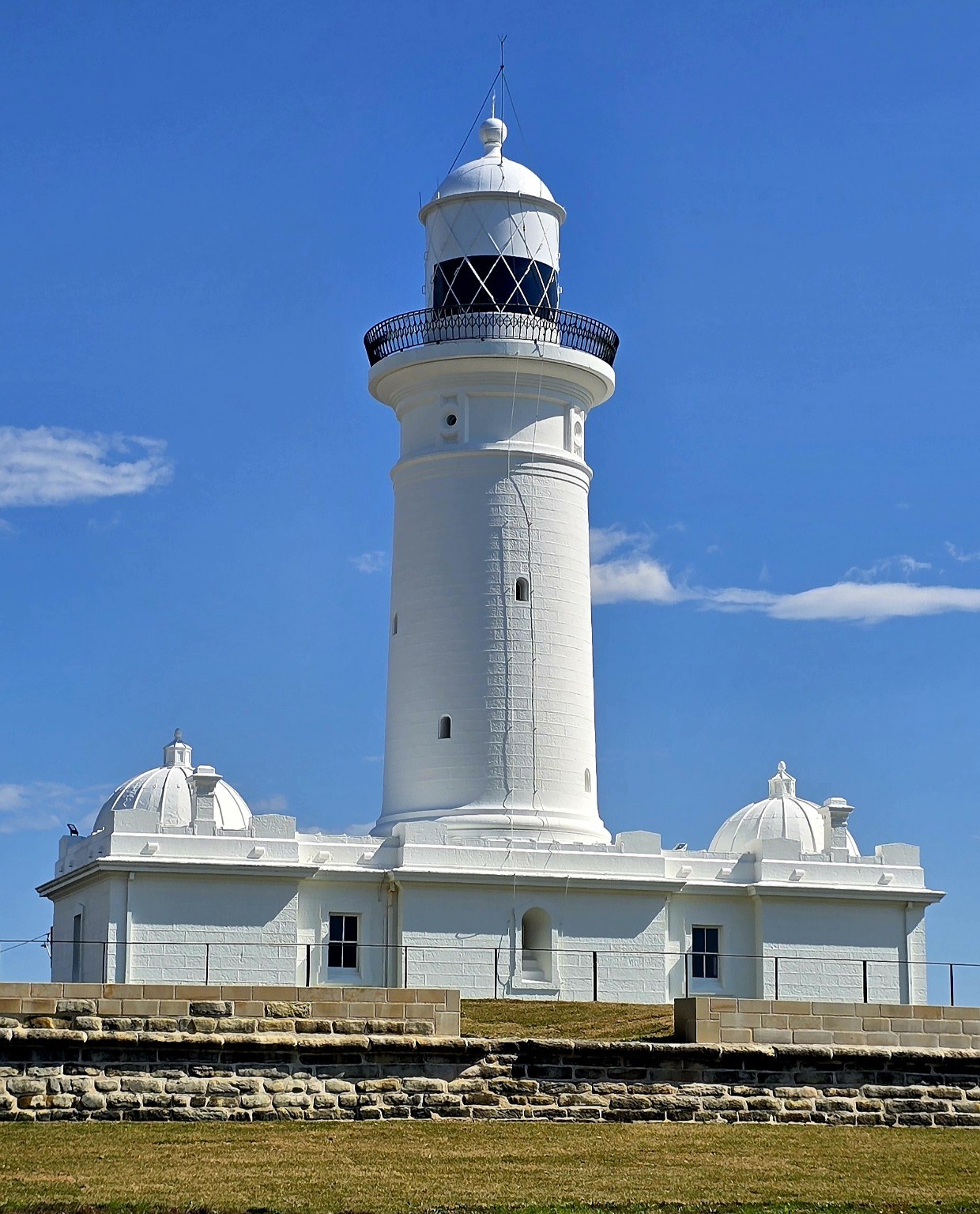 Macquarie Lighthouse, a white sandstone lighthouse at South Head