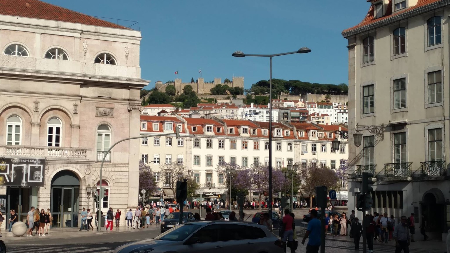 Lisbon square with São Jorge Castle visible in the distance