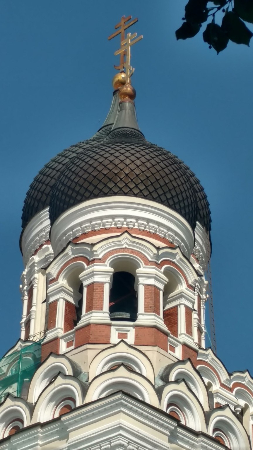 The black onion dome and gilded cross of Alexander Nevsky Cathedral on Toompea Hill