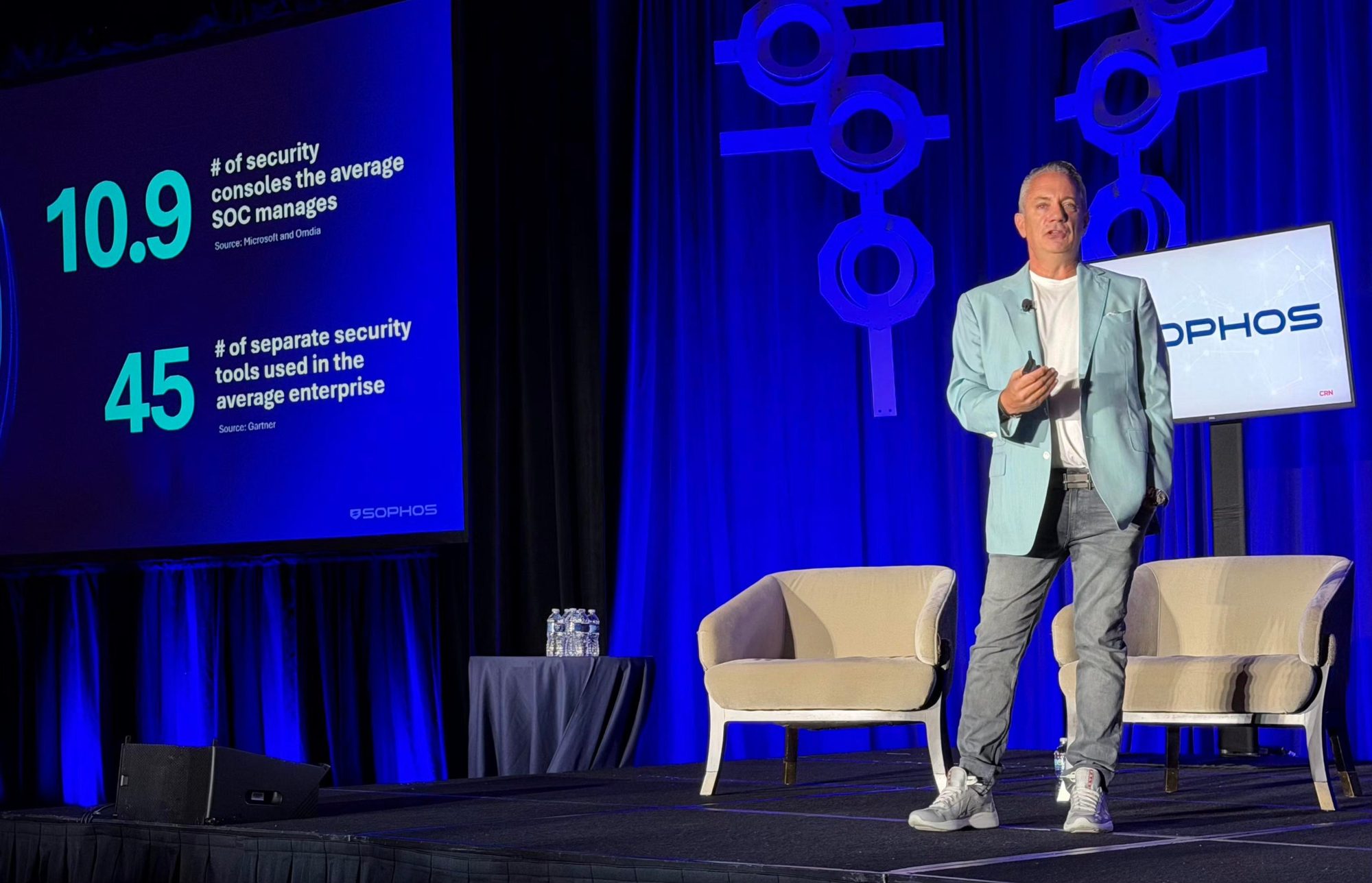 Scott Barlow speaking on stage