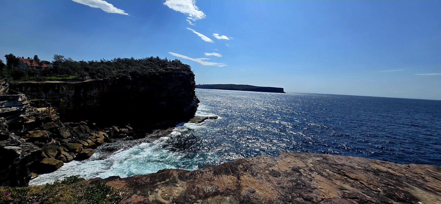 Sandstone cliffs and rocky shoreline along the Coogee to Bondi walk