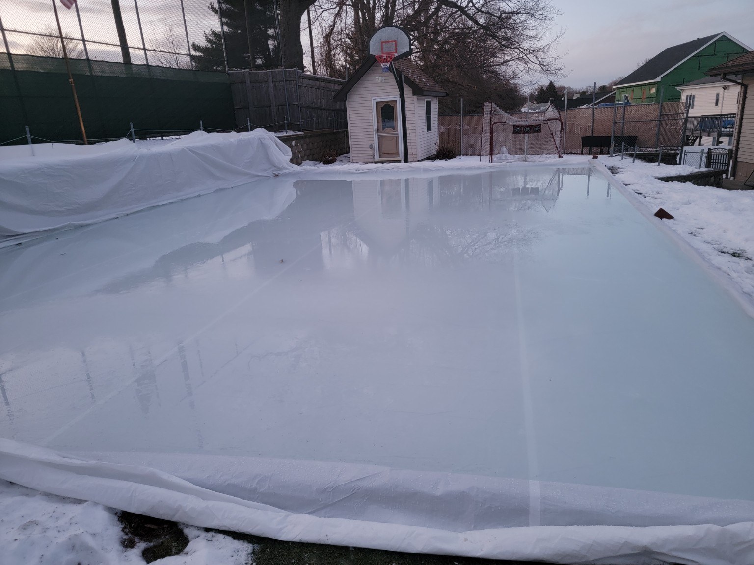 Mirror-smooth ice surface on the court rink