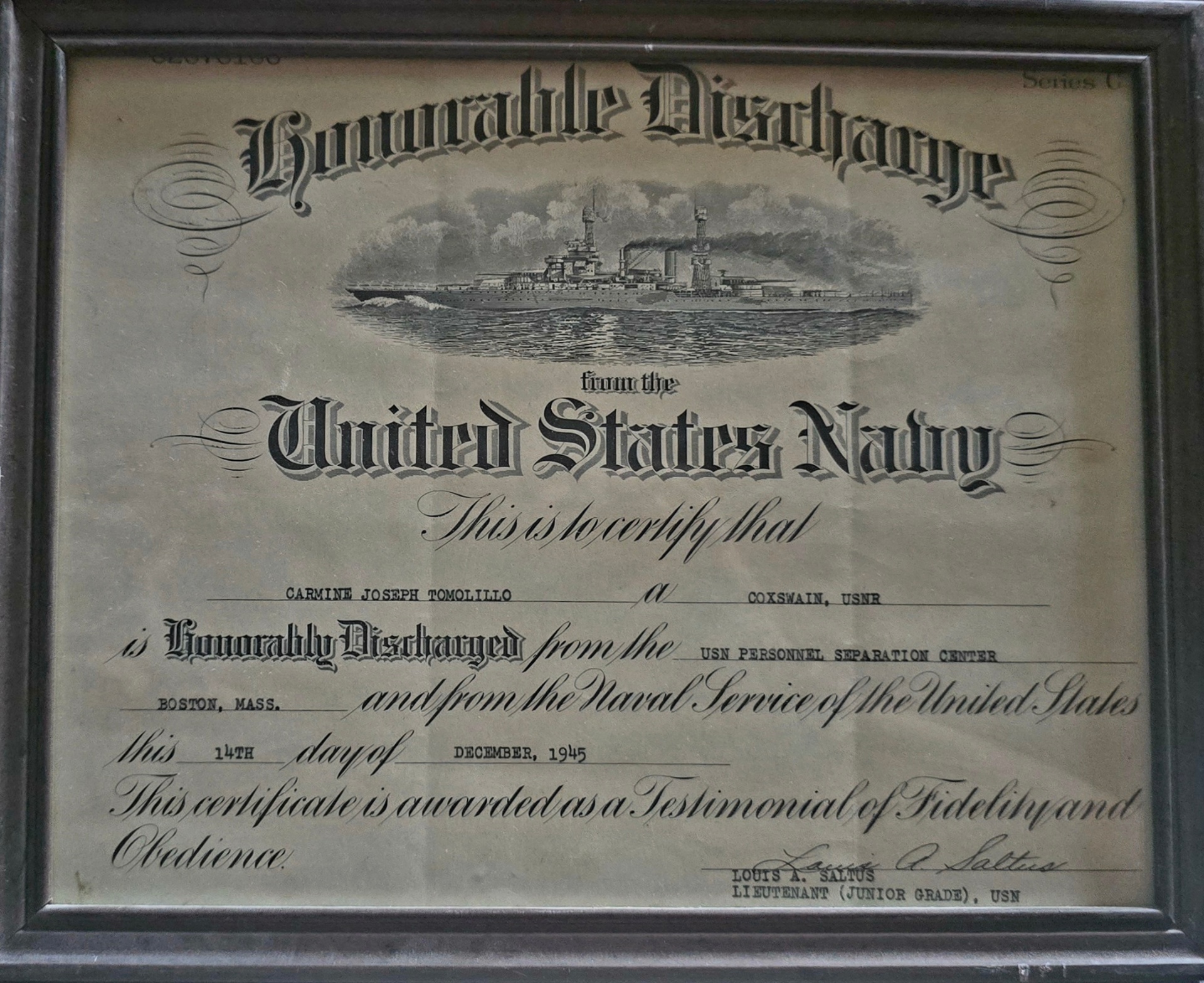 Honorable Discharge certificate from the United States Navy issued to Carmine Joseph Tomolillo