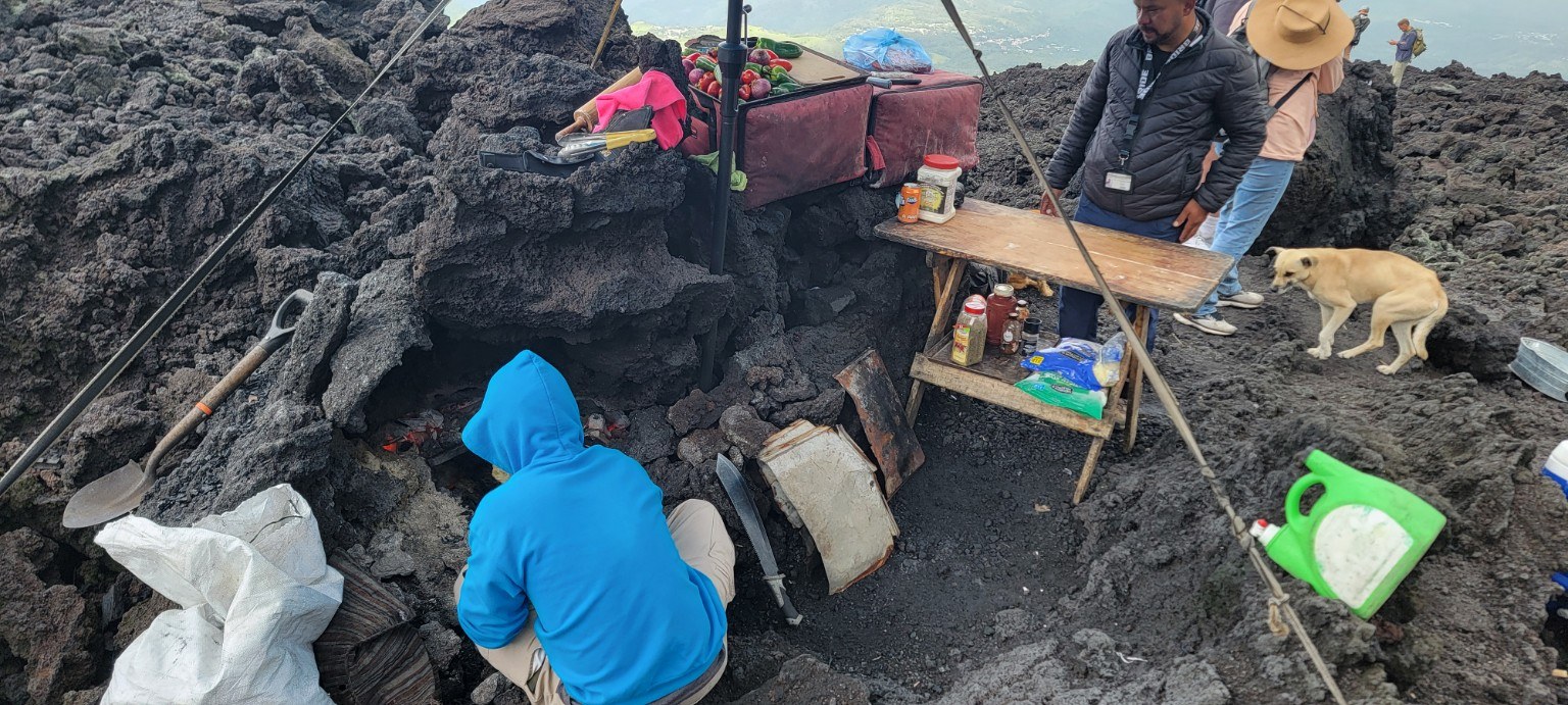 Marshmallow and snack stall set up among the lava rocks near the Pacaya cone