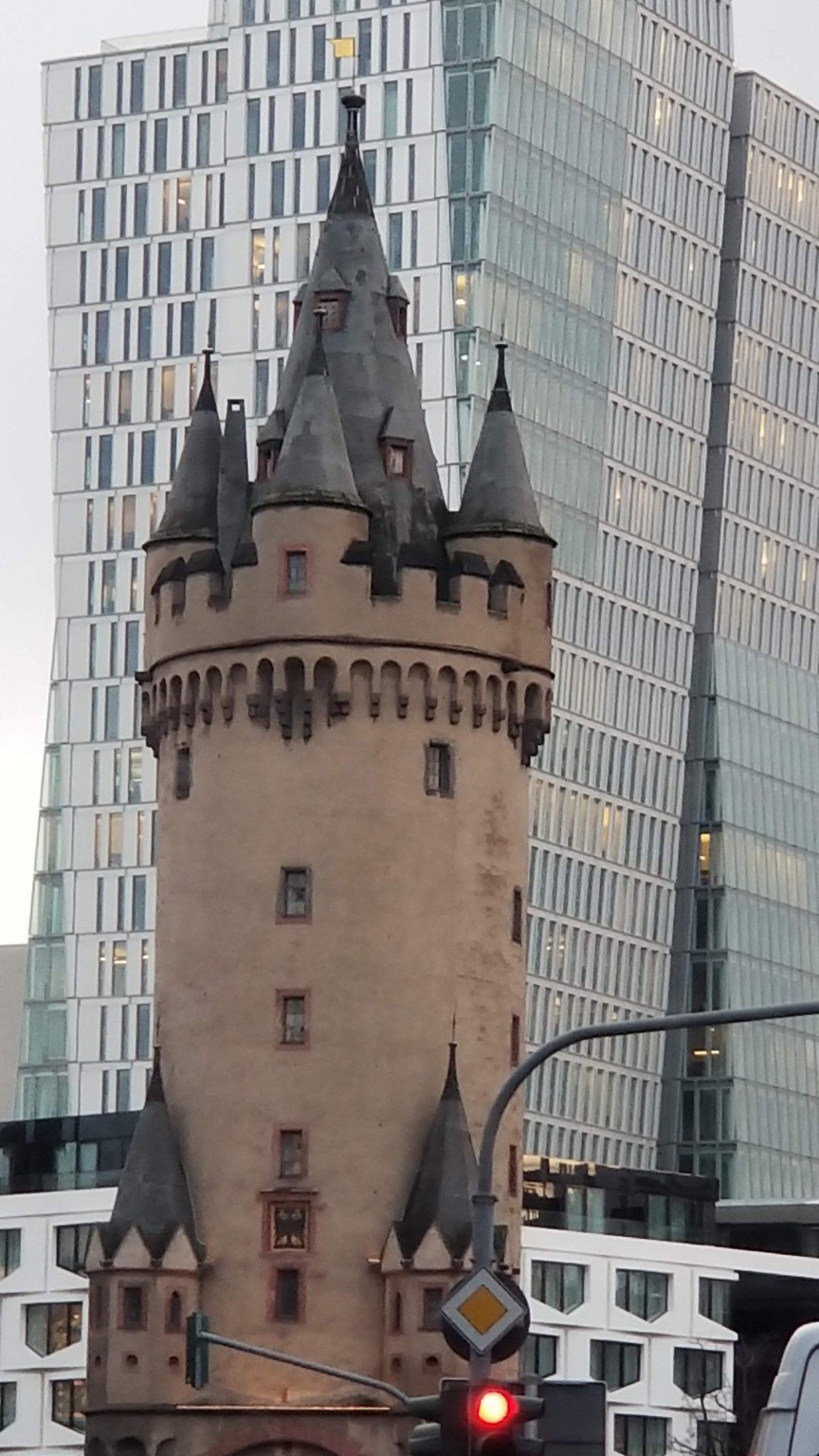 Frankfurt's Eschenheimer Turm, a medieval gate tower among modern glass