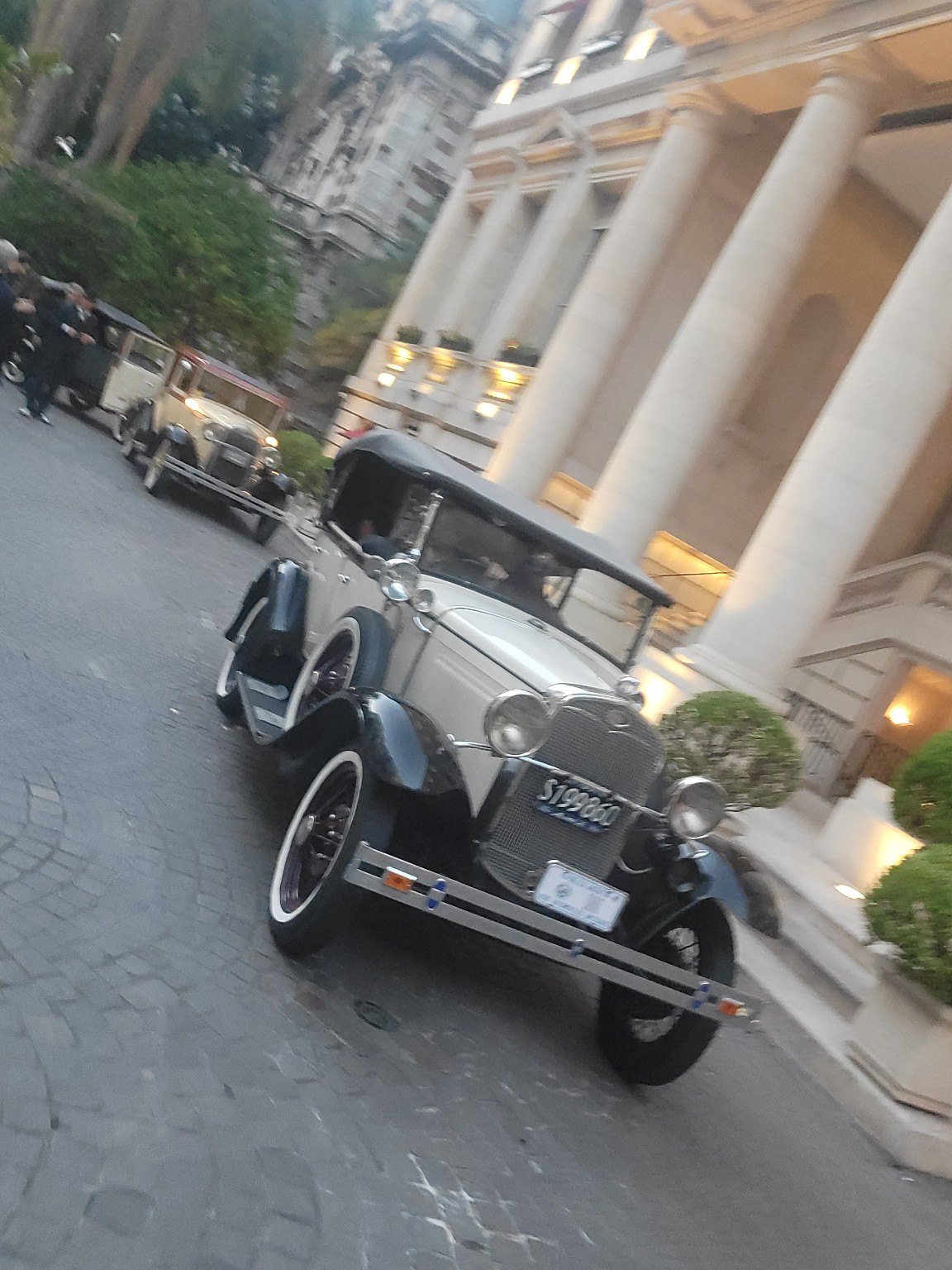 Vintage car outside a grand Buenos Aires building