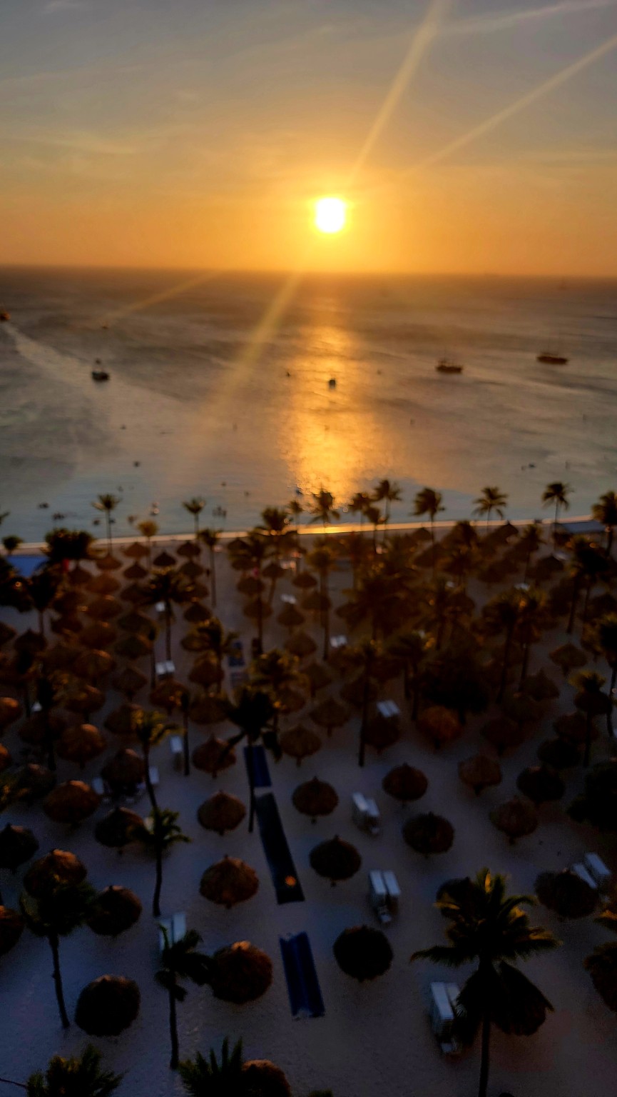 Golden hour over a resort beach in Aruba